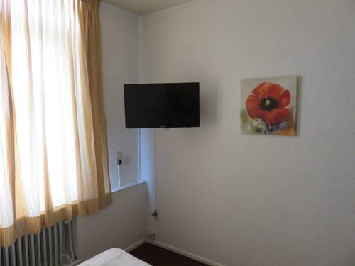 Imagen de la habitación del Hotel American, Venlo. Foto 3