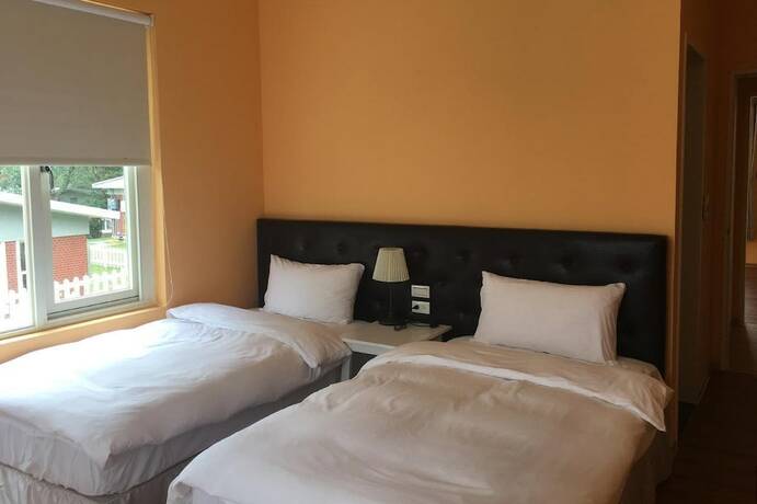 Imagen de la habitación del Hotel American Village Resort. Foto 25