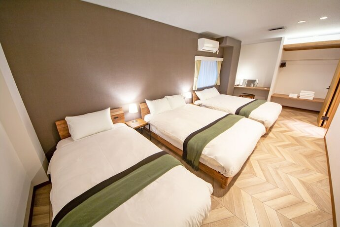 Imagen de la habitación del Hotel American Vintage Suite. Foto 22