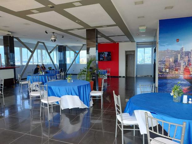Imagen del bar/restaurante del Hotel American Visa Cali, Cali. Foto 3