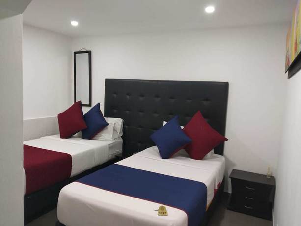 Imagen de la habitación del Hotel American Visa. Foto 12