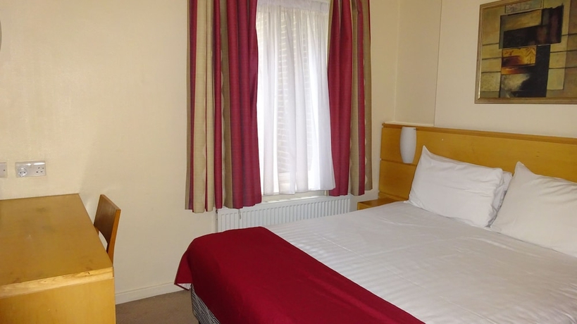 Imagen de la habitación del Hotel Americana. Foto 3