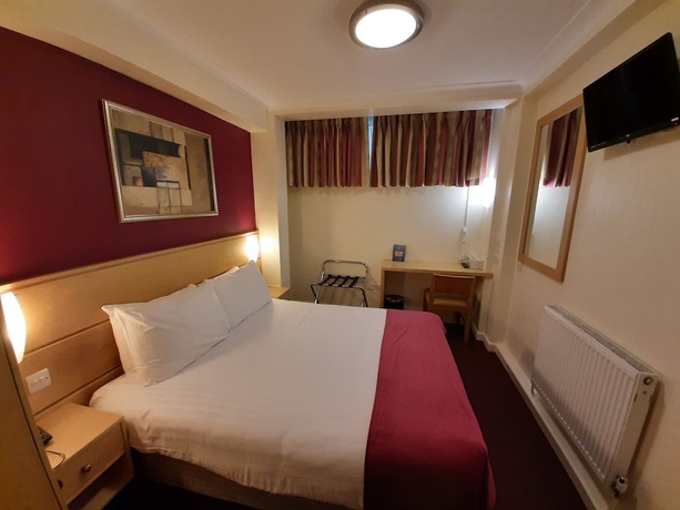 Imagen de la habitación del Hotel Americana, Londres. Foto 2