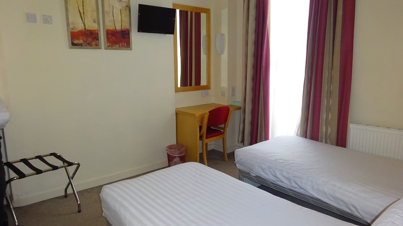 Imagen de la habitación del Hotel Americana, Londres. Foto 7
