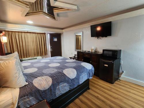Imagen de la habitación del Hotel Americas Best Value Inn And Suites Little Rock At Scott Hamilton Dr. Foto 16