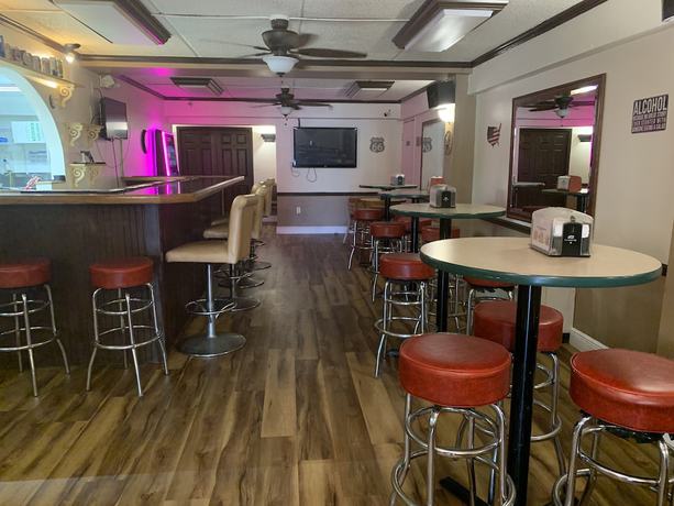 Imagen del bar/restaurante del Hotel Americas Best Value Inn And Suites Melbourne. Foto 4