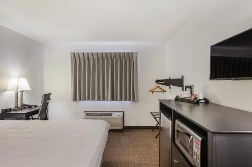 Imagen de la habitación del Hotel Americas Best Value Inn Birch Run. Foto 15