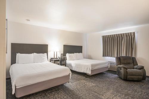 Imagen de la habitación del Hotel Americas Best Value Inn Birch Run. Foto 16