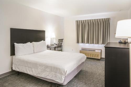Imagen de la habitación del Hotel Americas Best Value Inn Birch Run. Foto 20