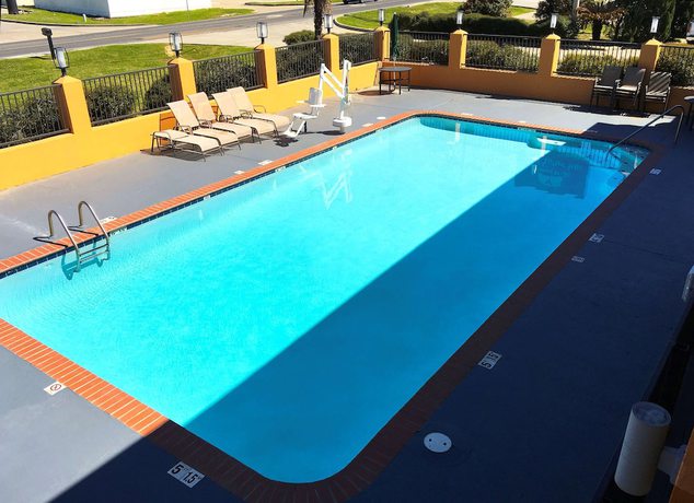 Imagen de la piscina del Hotel Americas Best Value Inn Denham Springs Baton Rouge. Foto 15