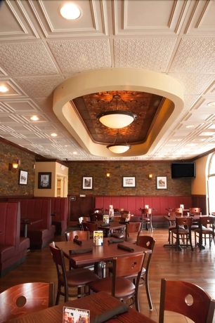 Imagen del bar/restaurante del Hotel Americas Best Value Inn Romulus Detroit Airport. Foto 4