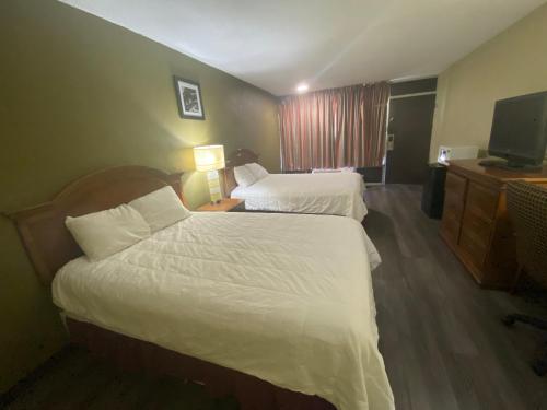 Imagen de la habitación del Hotel Americas Best Value Inn Wilson. Foto 11