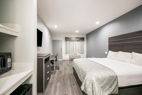 Imagen de la habitación del Hotel Americas Best Value Inn & Suites NE Houston Downtown I-610. Foto 14