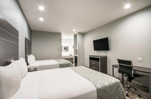 Imagen de la habitación del Hotel Americas Best Value Inn & Suites NE Houston Downtown I-610. Foto 18