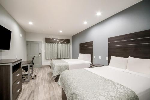 Imagen de la habitación del Hotel Americas Best Value Inn & Suites NE Houston Downtown I-610. Foto 20