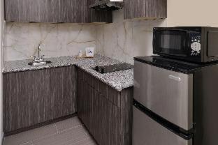Imagen de la habitación del Hotel Americas Best Value Inn and Suites Houston At Hwy 6 and Westpark. Foto 14