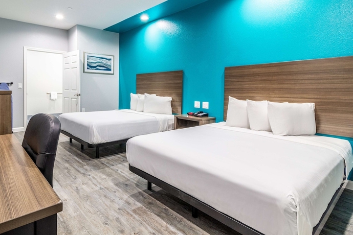 Imagen de la habitación del Hotel Americas Best Value Inn and Suites Kingwood IAH Airport. Foto 7
