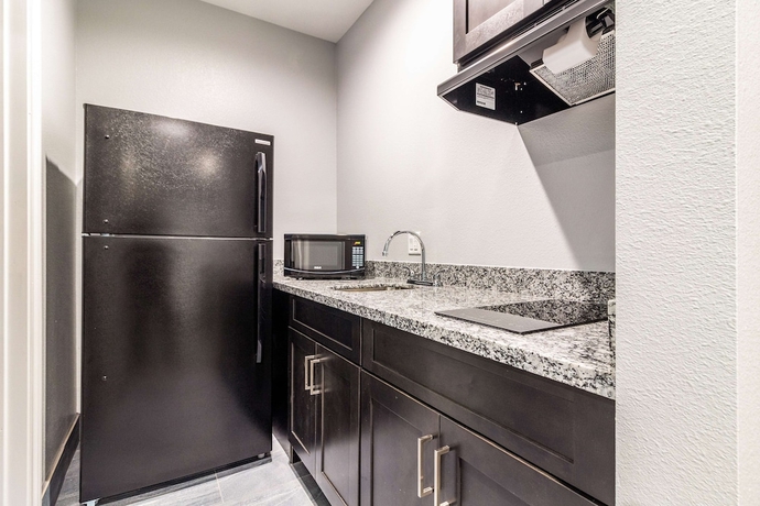 Imagen de la habitación del Hotel Americas Best Value Inn and Suites Kingwood IAH Airport. Foto 10