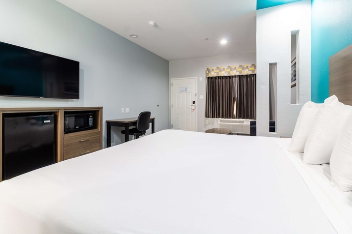 Imagen de la habitación del Hotel Americas Best Value Inn and Suites Kingwood IAH Airport. Foto 18