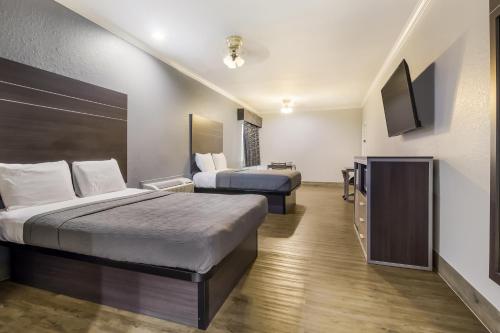 Imagen de la habitación del Hotel Americas Best Value Platinum Inn and Suites. Foto 19