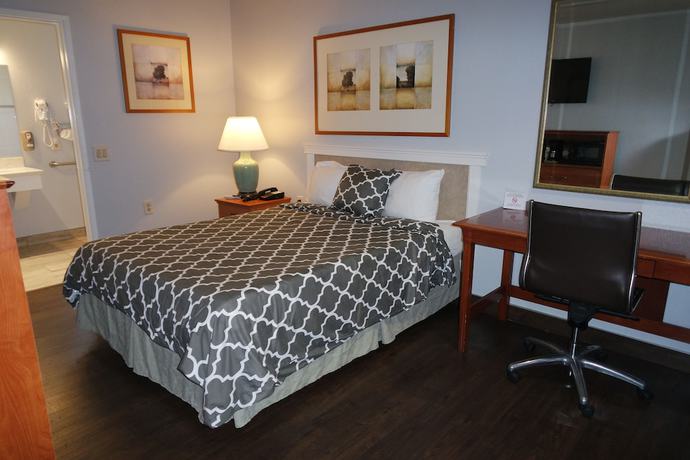 Imagen de la habitación del Hotel Americas Inn And Suite. Foto 7