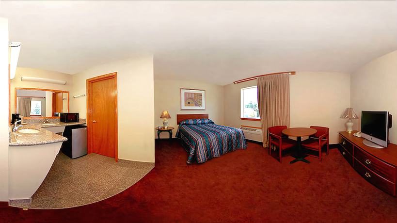 Imagen de la habitación del Hotel Americas Inn And Suite. Foto 11