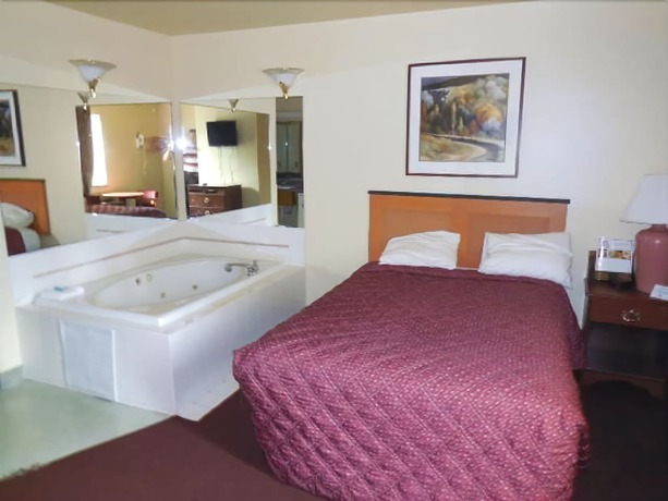 Imagen de la habitación del Hotel Americas Inn And Suite. Foto 12