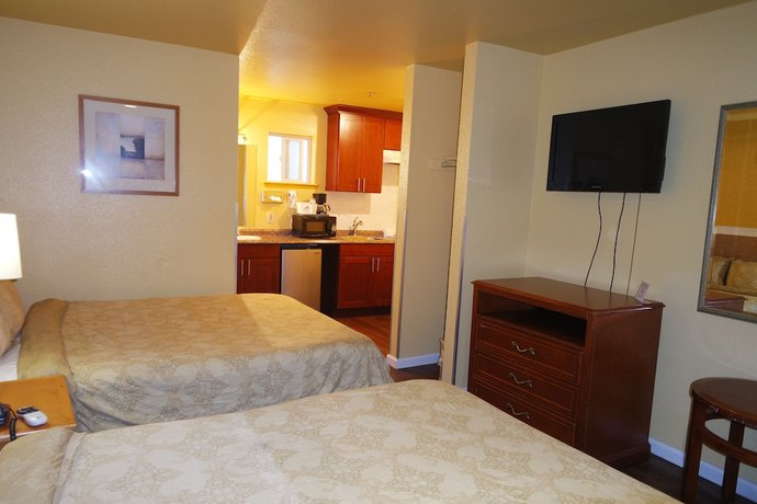 Imagen de la habitación del Hotel Americas Inn And Suite. Foto 14