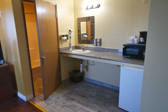 Imagen de la habitación del Hotel Americas Inn And Suite. Foto 16