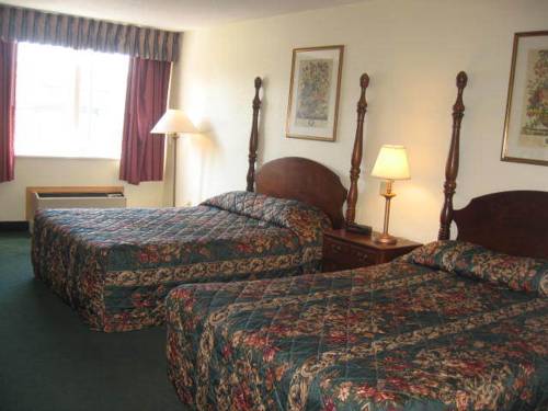 Imagen de la habitación del Hotel America's Inn. Foto 4