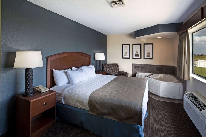 Imagen de la habitación del Hotel Americinn By Wyndham Bay City. Foto 7