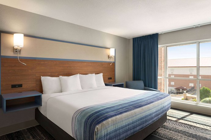 Imagen de la habitación del Hotel Americinn By Wyndham Branson and Conference Center. Foto 14