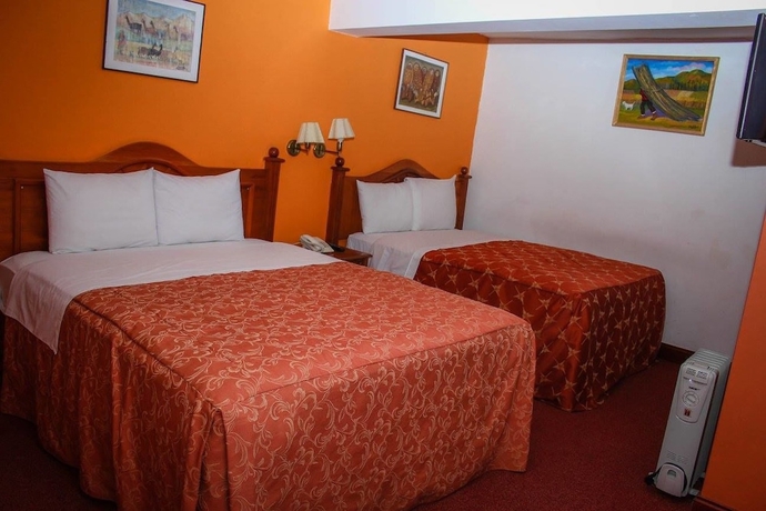 Imagen de la habitación del Hotel Amerinka Boutique. Foto 10