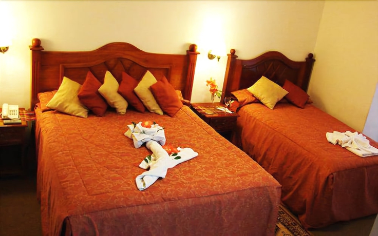 Imagen de la habitación del Hotel Amerinka Boutique. Foto 12