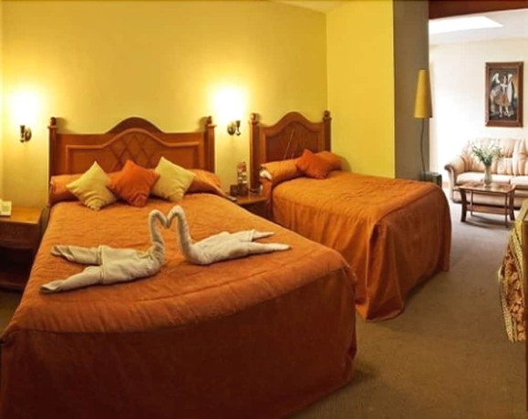 Imagen de la habitación del Hotel Amerinka Boutique. Foto 13