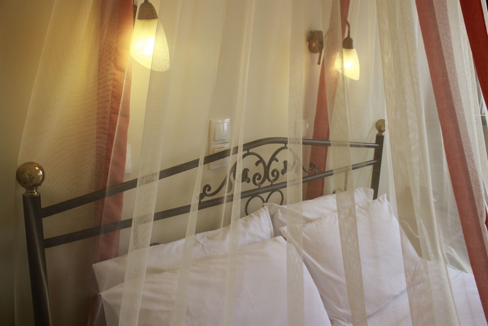 Imagen de la habitación del Hotel Amerisa Suites and Villa. Foto 1