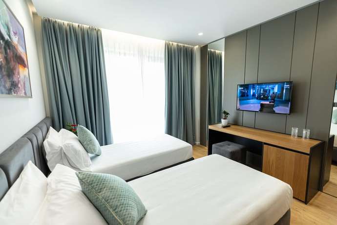 Imagen de la habitación del Hotel Ames Hotel and SPA. Foto 10