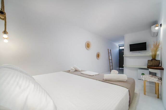 Imagen de la habitación del Hotel Amethyst Luxury Suites. Foto 13
