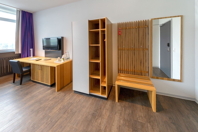 Imagen de la habitación del Hotel Amh Airport-messe-hotel. Foto 11