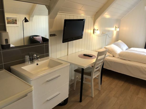 Imagen de la habitación del Hotel Ami hotel. Foto 10