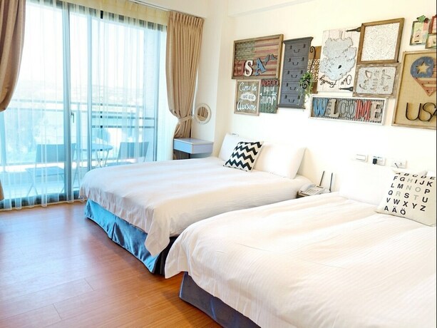 Imagen de la habitación del Hotel Amibao Resort. Foto 14