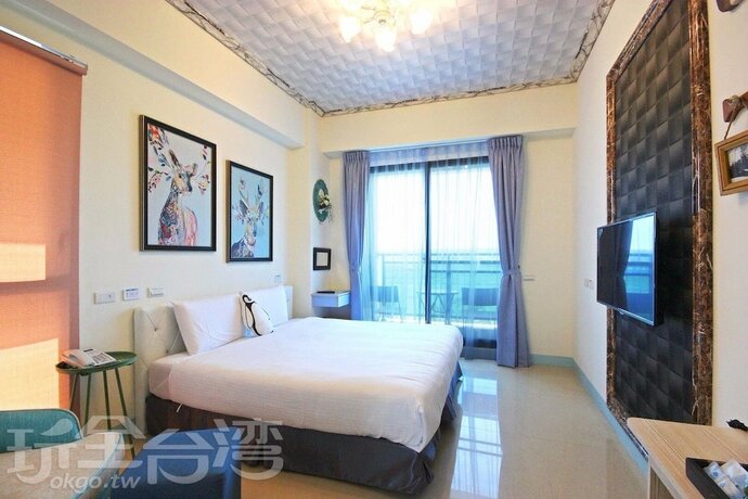 Imagen de la habitación del Hotel Amibao Resort. Foto 16