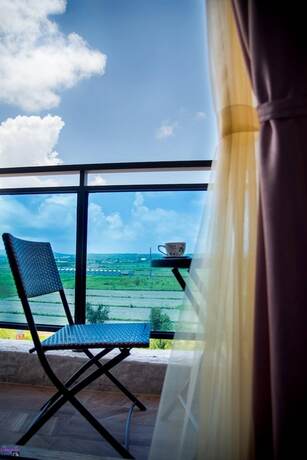 Imagen de la habitación del Hotel Amibao Resort. Foto 17