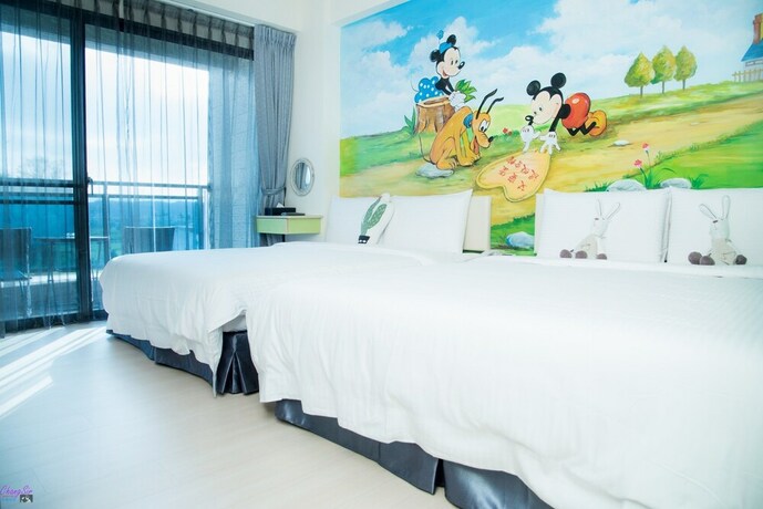 Imagen de la habitación del Hotel Amibao Resort. Foto 21