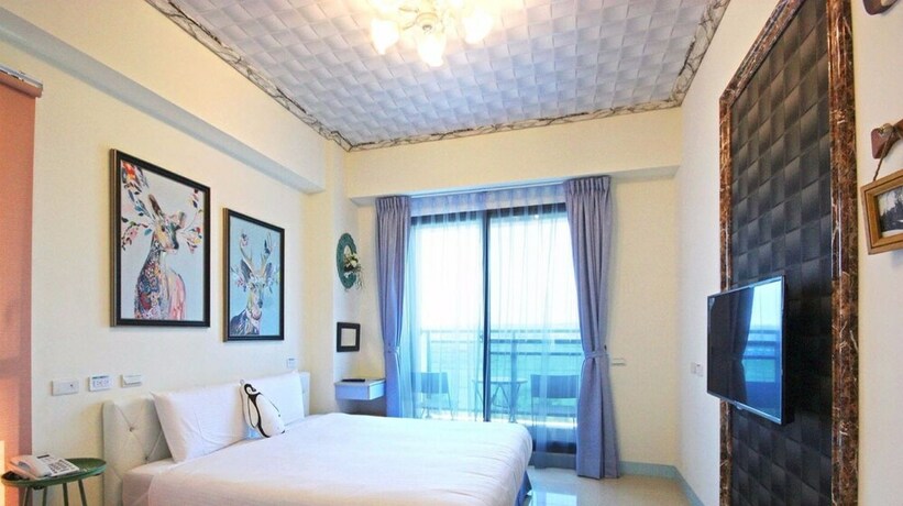 Imagen de la habitación del Hotel Amibao Resort. Foto 29