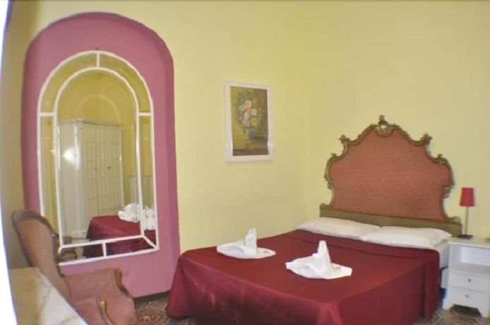 Imagen de la habitación del Hotel Amico. Foto 7