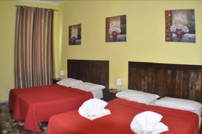 Imagen de la habitación del Hotel Amico. Foto 10