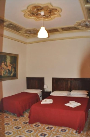 Imagen de la habitación del Hotel Amico. Foto 11
