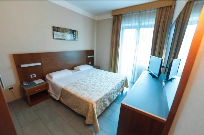 Imagen de la habitación del Hotel Amico, MARINA DI CITTA SANT ANGELO. Foto 6