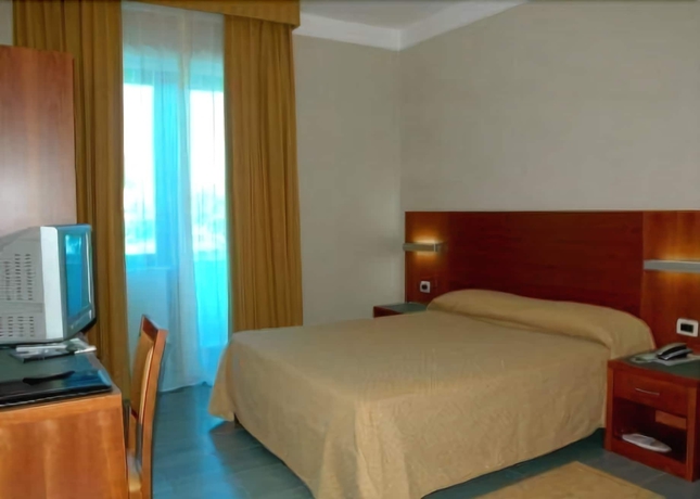 Imagen de la habitación del Hotel Amico, MARINA DI CITTA SANT ANGELO. Foto 8